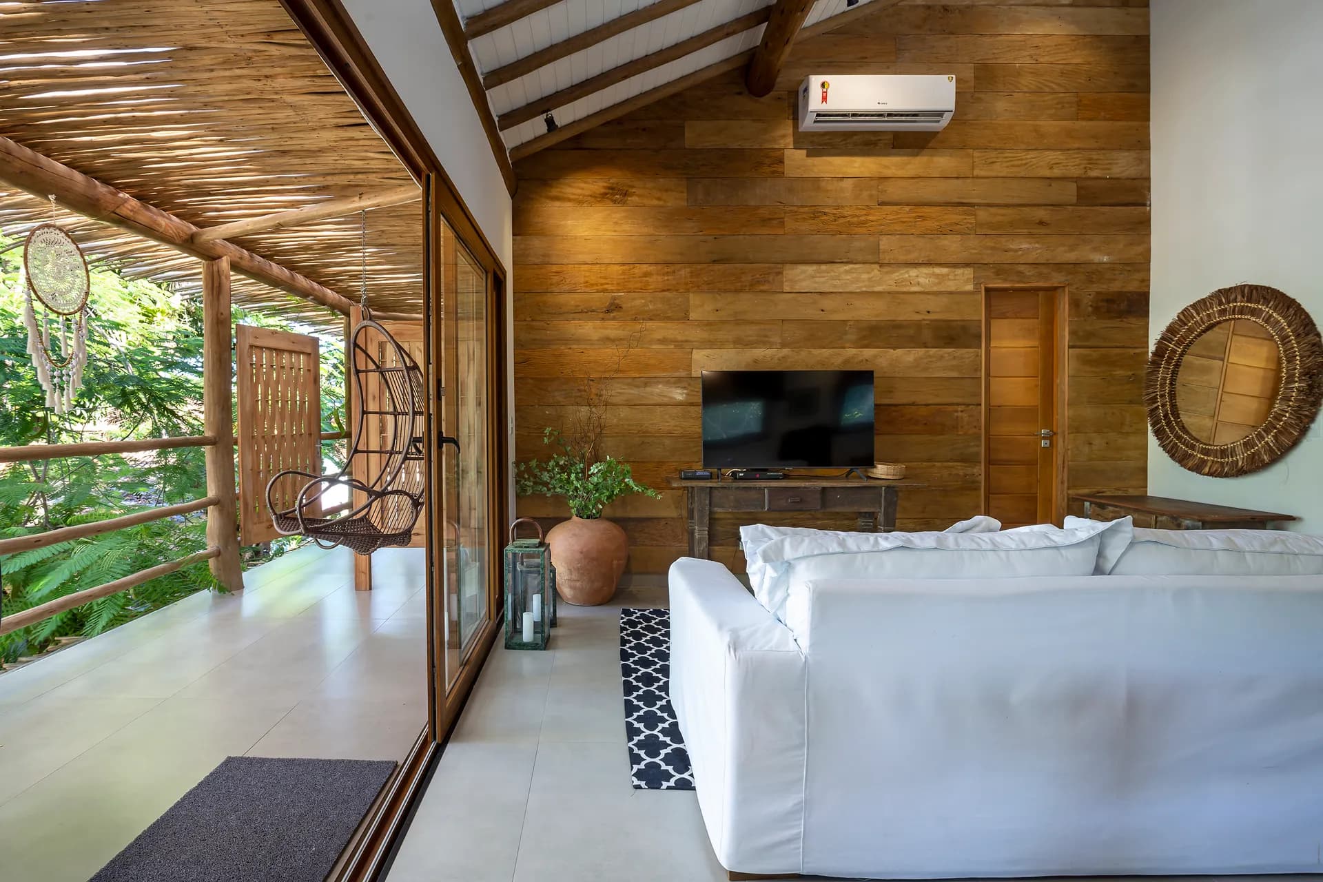 Sala de estar com acesso à varanda — Residência de 1 Suíte